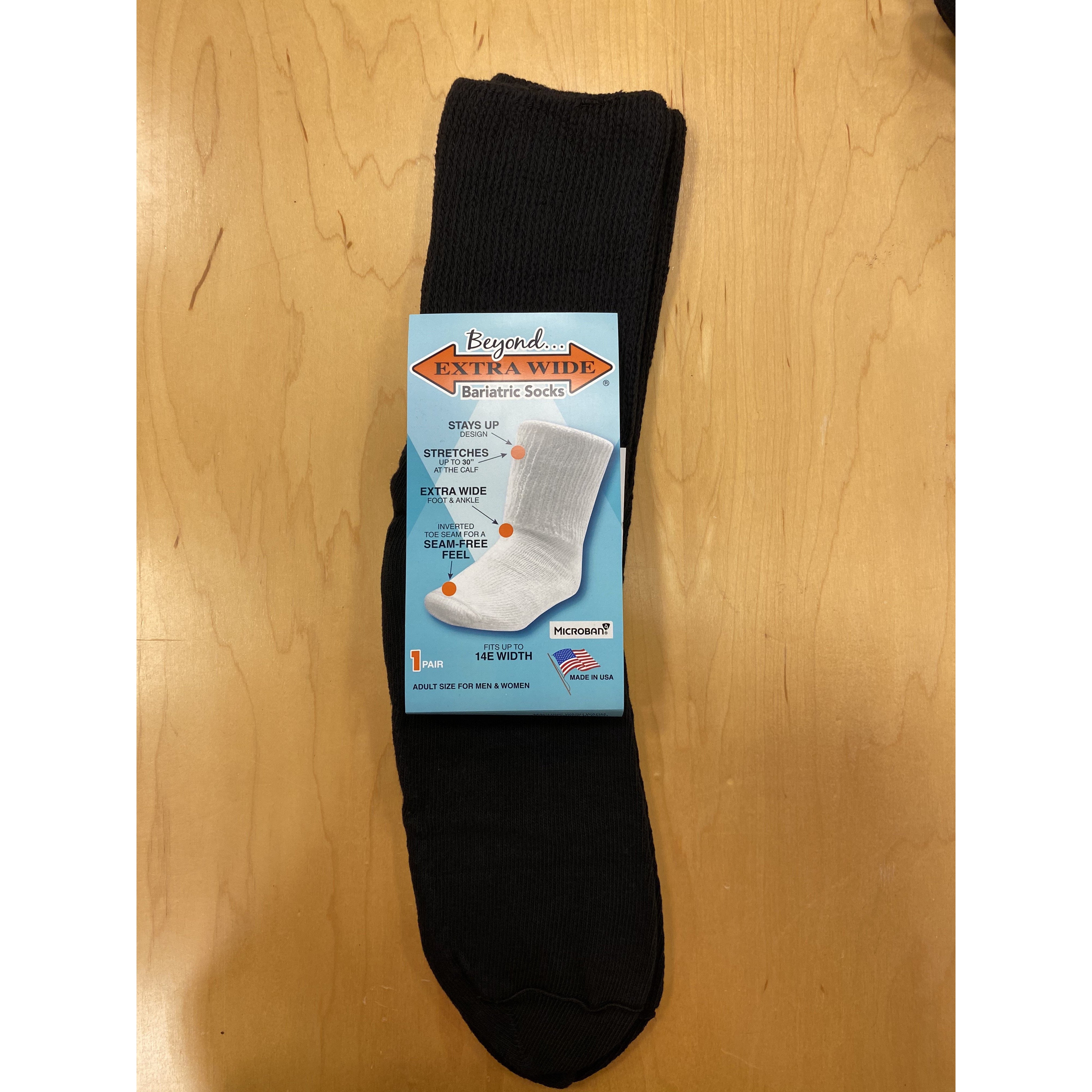 Beyond Extra Wide Bariatric Socks, with Stay Up design, are loose, yet stay up for the ultimate in comfort for those who suffer from ankle swelling and tight, uncomfortable socks. Stretches wide through the whole sock, yet will not cut off circulation. Available in white and black. Fits up to a size 6E width. Made in the USA. 